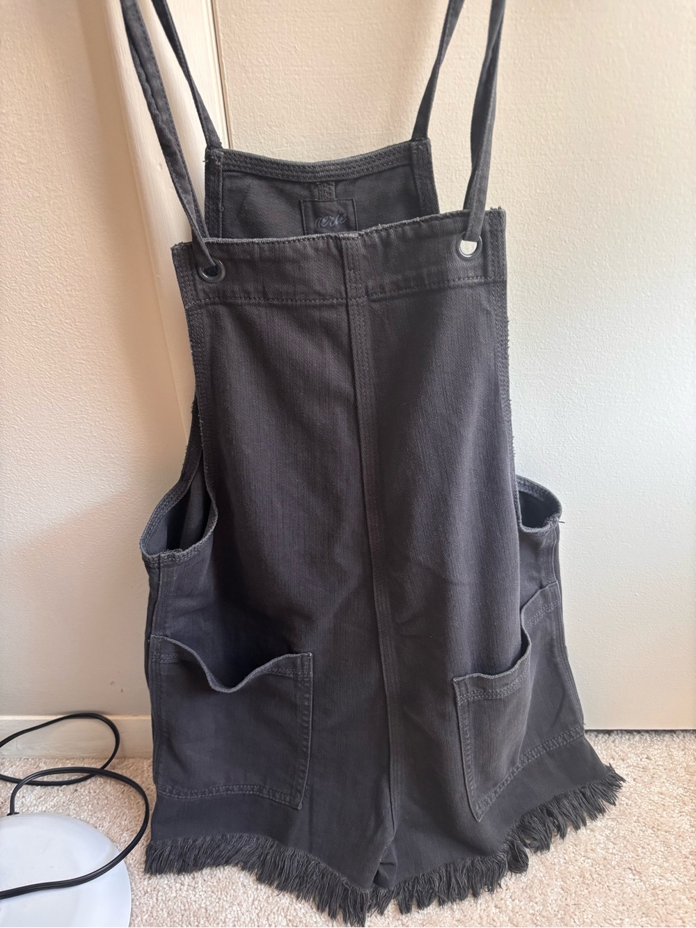 aerie black denim romper with fringe hem